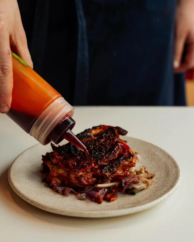 Chicken leg marinated in guajillo and shio koji, then grilled straight over the flames and served on coral kale (worth a Google). Techy treatment, beautifully simple results. Grab it for lunch this week in the wine bar.