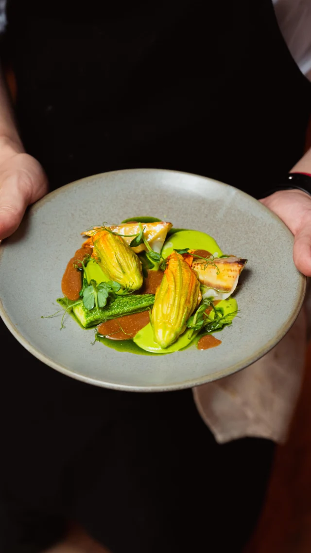 We eat well here, that’s no secret. Every week brings someone new to the table — fresh ideas, bold flavours and brilliant chefs from every corner of the culinary map. But every so often, someone really special rolls in. Someone like Luke NG (@ngchm).
A rising star with serious momentum, Luke is pushing his cooking into all kinds of exciting territory — for his week with us he’s combining his Hong Kong heritage with fine-dining fervour for a reimagined take on the classic Hong Kong Tea House — “茶樓”. Expect pitch-perfect-precision, a hint of nostalgia and a whole lot of flavour.
Here he gives us a sneak peek behind the curtain with his ‘Siu Mai stuffed courgette flowers, courgette velouté, carabinero bisque’. A dish that’s every bit as elegant as it sounds. Delicate, detailed, and just the right amount of decadent.
There’s still time for you to pull up a seat at the table, just hit the link in our bio grab yours. We eat well here, that’s no secret. Every week brings someone new to the table — fresh ideas, bold flavours and brilliant chefs from every corner of the culinary map. But every so often, someone really special rolls in. Someone like Luke NG (@ngchm).
A rising star with serious momentum, Luke is pushing his cooking into all kinds of exciting territory — for his week with us he’s combining his Hong Kong heritage with fine-dining fervour for a reimagined take on the classic Hong Kong Tea House — “茶樓”. Expect pitch-perfect-precision, a hint of nostalgia and a whole lot of flavour.
Here he gives us a sneak peek behind the curtain with his ‘Siu Mai stuffed courgette flowers, courgette velouté, carabinero bisque’. A dish that’s every bit as elegant as it sounds. Delicate, detailed, and just the right amount of decadent.
There’s still time for you to pull up a seat at the table, just hit the link in our bio grab yours.