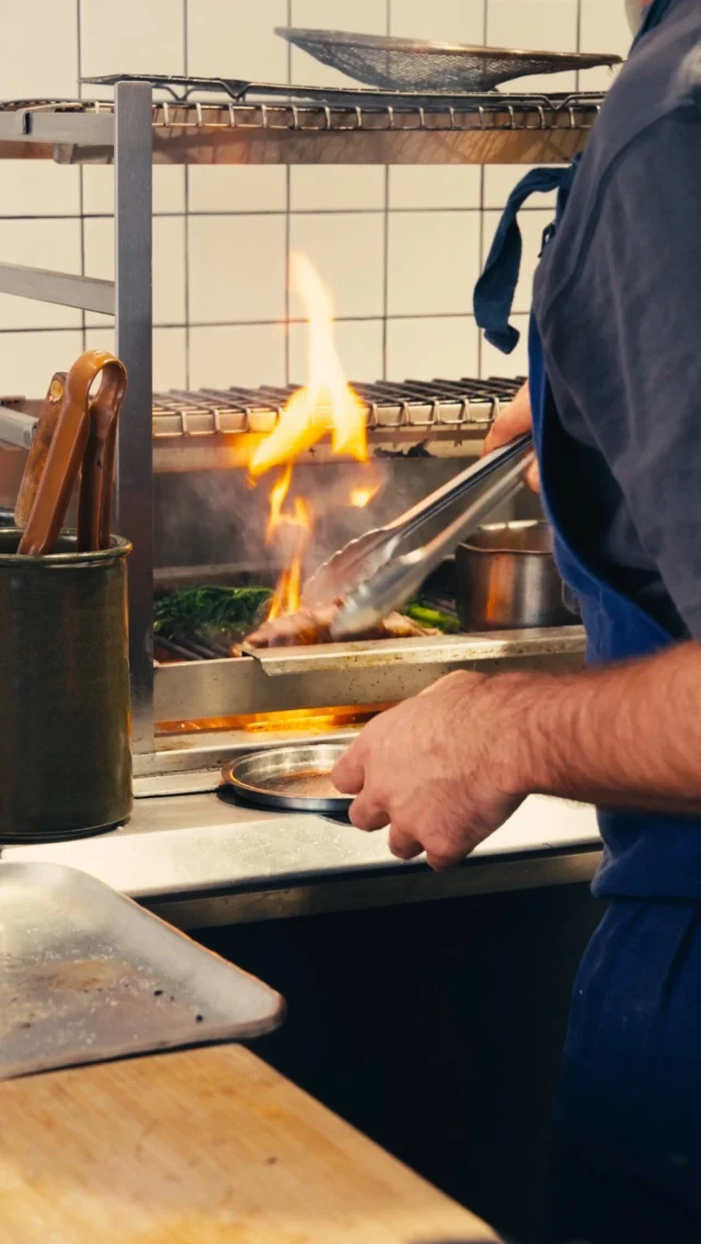 Refreshing our Wine Bar menu is always a nice exercise, exploring new ingredients and different techniques that not only helps us keep it fresh for all of you who visit but means our chefs get to flex their creative muscles too.
Hitting the menu this week, our ‘Grilled duck, quince & almond mole, pomegranate’. A bit of a showstopper, comforting, autumnal and delicious.
Sit back and enjoy as Ollie runs you through the process; from brining to ageing, then oven to grill where it spends a few final moments rendering itself into perfect poise. Accompanied by the cured and confited legs, some greens and a warming sauce that’ll have you murmuring the words ‘𝘎𝘦𝘵 𝘵𝘩𝘦 𝘧𝘪𝘳𝘦 𝘰𝘯’. 
𝘈𝘷𝘢𝘪𝘭𝘢𝘣𝘭𝘦 𝘢𝘵 𝘣𝘰𝘵𝘩 𝘭𝘶𝘯𝘤𝘩 𝘢𝘯𝘥 𝘥𝘪𝘯𝘯𝘦𝘳, 𝘵𝘪𝘮𝘦 𝘵𝘰 𝘱𝘶𝘭𝘭 𝘶𝘱 𝘢 𝘤𝘩𝘢𝘪𝘳. Refreshing our Wine Bar menu is always a nice exercise, exploring new ingredients and different techniques that not only helps us keep it fresh for all of you who visit but means our chefs get to flex their creative muscles too.
Hitting the menu this week, our ‘Grilled duck, quince & almond mole, pomegranate’. A bit of a showstopper, comforting, autumnal and delicious.
Sit back and enjoy as Ollie runs you through the process; from brining to ageing, then oven to grill where it spends a few final moments rendering itself into perfect poise. Accompanied by the cured and confited legs, some greens and a warming sauce that’ll have you murmuring the words ‘𝘎𝘦𝘵 𝘵𝘩𝘦 𝘧𝘪𝘳𝘦 𝘰𝘯’. 
𝘈𝘷𝘢𝘪𝘭𝘢𝘣𝘭𝘦 𝘢𝘵 𝘣𝘰𝘵𝘩 𝘭𝘶𝘯𝘤𝘩 𝘢𝘯𝘥 𝘥𝘪𝘯𝘯𝘦𝘳, 𝘵𝘪𝘮𝘦 𝘵𝘰 𝘱𝘶𝘭𝘭 𝘶𝘱 𝘢 𝘤𝘩𝘢𝘪𝘳.